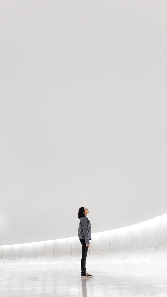 woman standing on ice